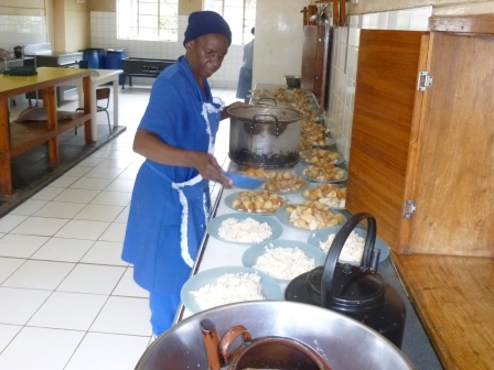 Cooks serving meals