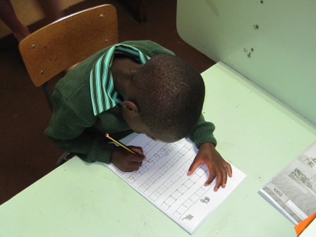 Pre-school child studying