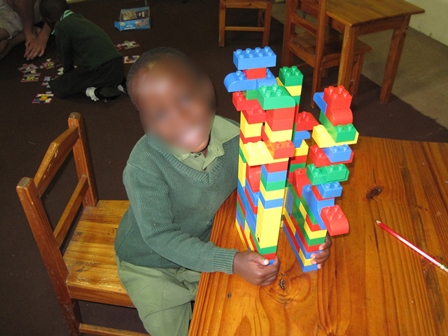 Child with Lego